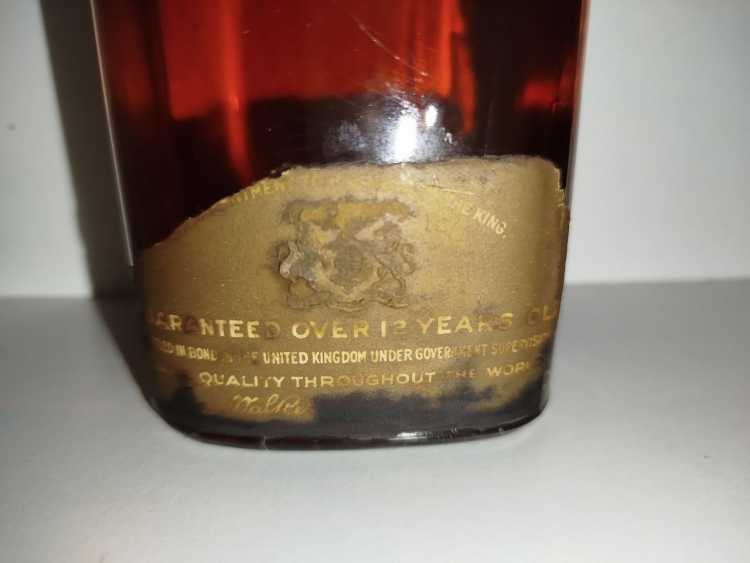 Johnnie Walker Extra Special Highland Whisky, no size, no abv; Guaranteed Over 12 years Old, By appointment to the late King George V